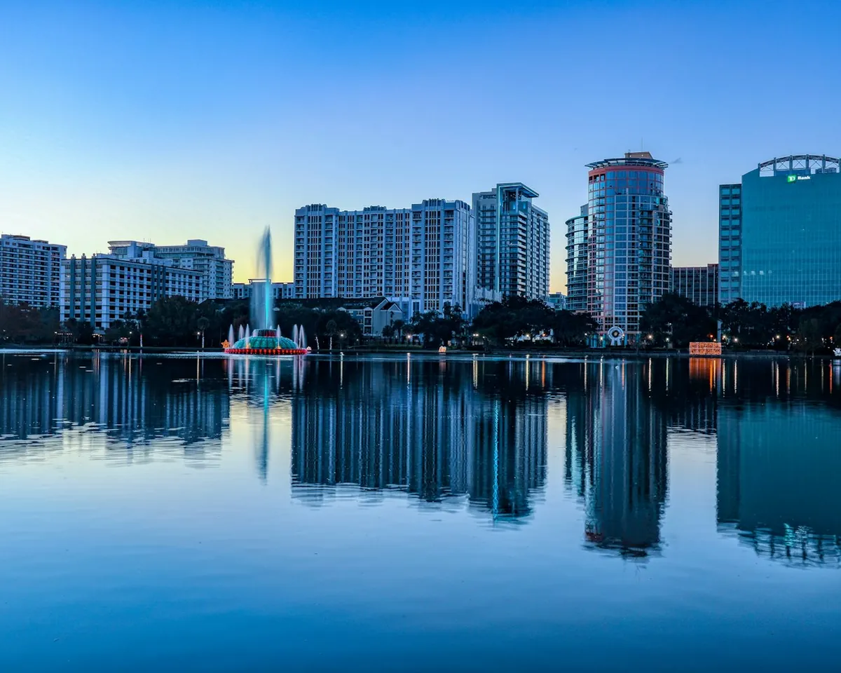 Downtown Orlando skyline reflected in Lake Eola, Florida